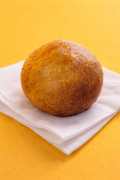 Golden egg roll on a white tissue paper